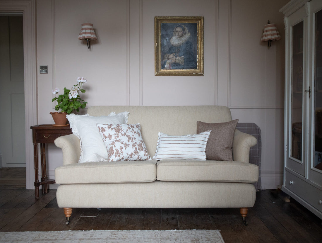 cream sofa and cushions