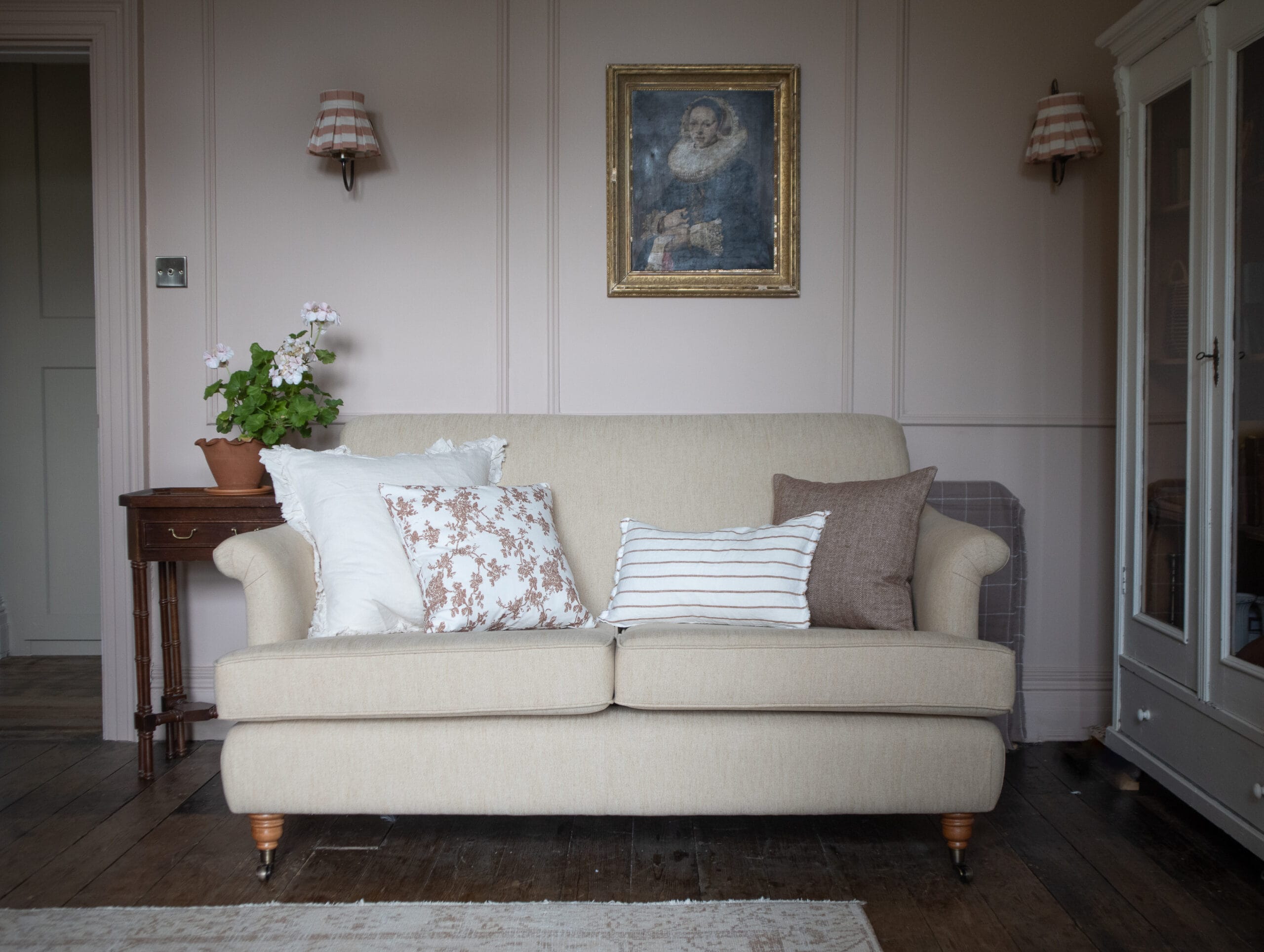 cream sofa and cushions