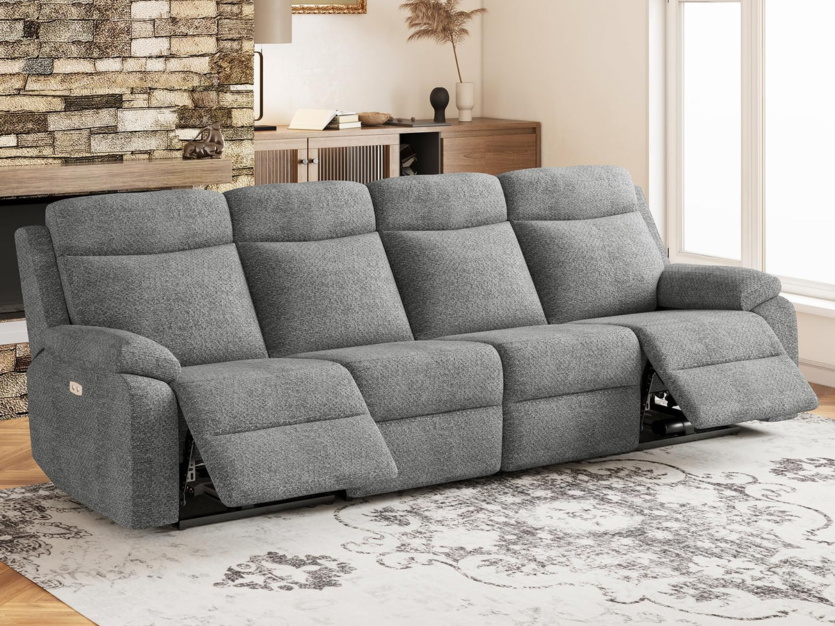 Grey four seat reclining sofa in a modern living room setting
